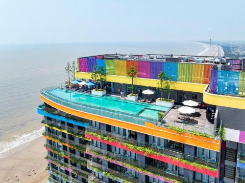 Hoang Hoa Hotel | Elegant Flamingo Ibiza Hải Tiến Resort with Oceanfront Views