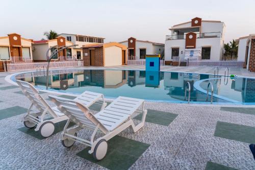 Una Hotel | Explore Flamingo Club and Resort Near Diu with Pool Access