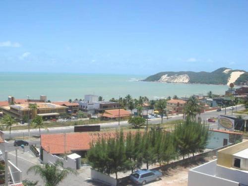 Ponta Negra Apartment | Ocean View Retreat: 4-Star Flat with Pool & Breakfast