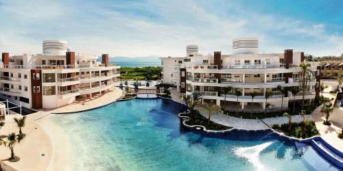 Ponta das Canas Apartment | Oceanfront Flat 3 Suites with Pool & Spa - Rated 9.4/10