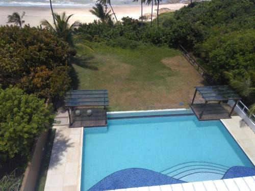 Conde Apartment | Oceanfront Flat with Pool & Family Amenities Await You