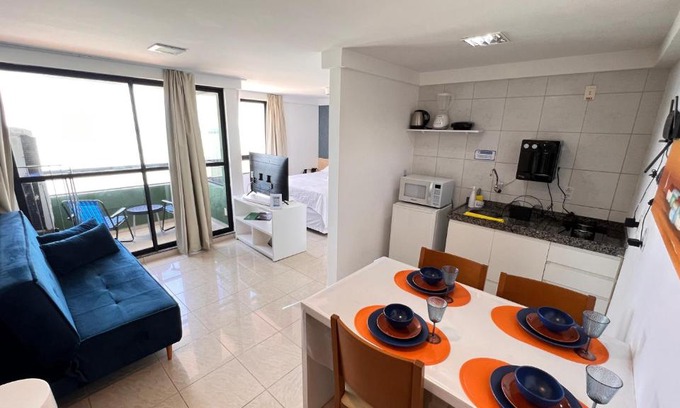 Areia Preta Apartment | Oceanfront Retreat: Guest Rated 9.6 with Pool & Pet-Friendly