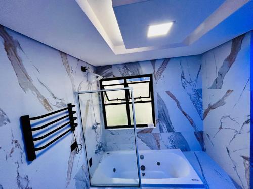 Sao Vicente Apartment | Relaxing Flat with Private Hot Tub & Pool, Steps from Beach