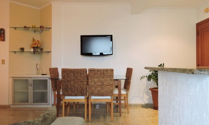 Pitangueiras Apartment | Beautiful Flat in Guarujá Steps from the Beach with Pool