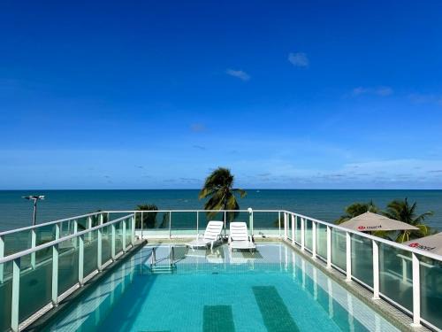 Cabo Branco Hotel | Oceanfront Flat at Nord Easy Green Sunset with Spa & Pool