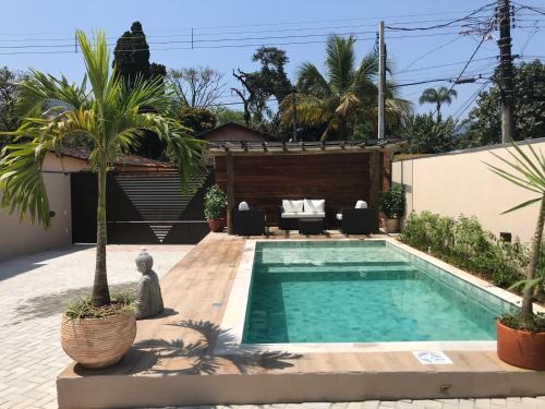 Boicucanga Beach House | Sumatra Flats: Ocean View Retreat with Pool Access
