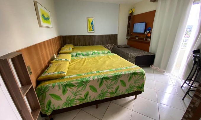 Do Turista Apartment | Experience Apt 711: Poolside Relaxation with Ocean Views