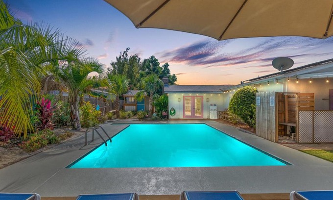 Upper Grand Lagoon House | Experience the Flirty Flamingo: Heated Pool & Game Room