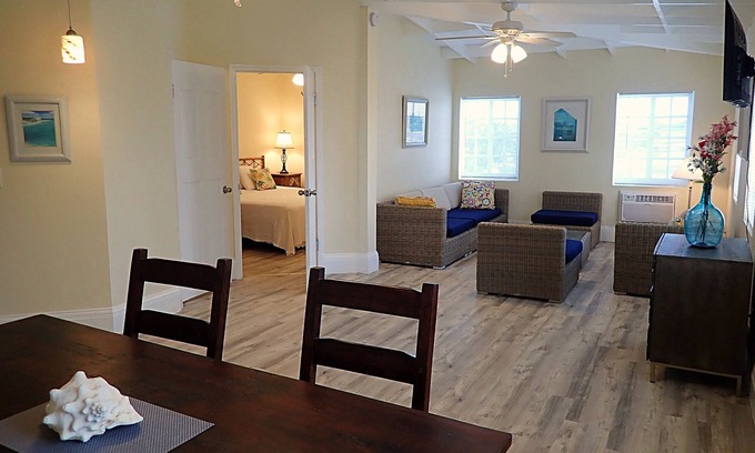 Cockburn Town Apartment | Flirty Flamingos: Oceanfront Bliss with Pool & Breakfast