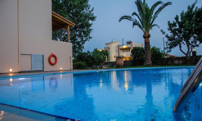 Gialos Apartment | Inviting Flisvos Rooms: Oceanfront Bliss with Pool & Pets