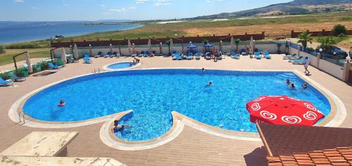 Sutluce Hotel | Beachfront Bliss at Flora Hotel with Pool & Ocean Views