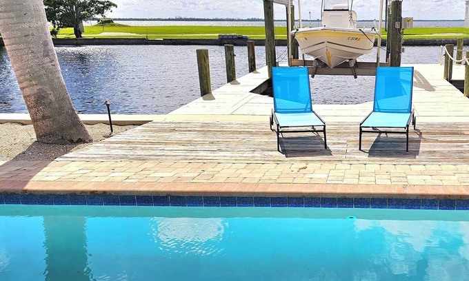 Biggar Villa | Florida Style Villa by the Water with heated Pool, Dock, Gulf access! Kayaks!