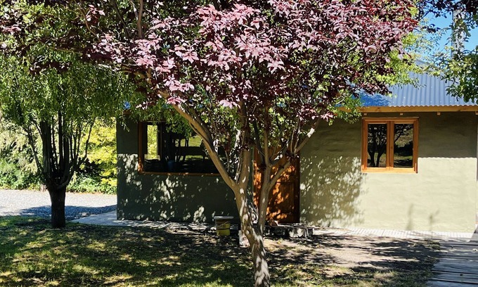 Junin de los Andes Cabin | Cozy Fly Fishing Cabin with Lake View and Spa Amenities
