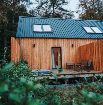 West Laroch Apartment | Forest Corner Apartment with Hot Tub & 9.9/10 Guest Rating