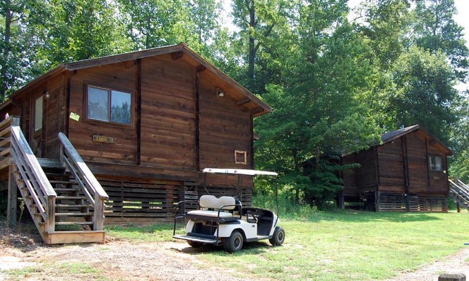 Advance Resort | Relax at Forest Lake Camping Resort Cabin 18 with Hot Tub