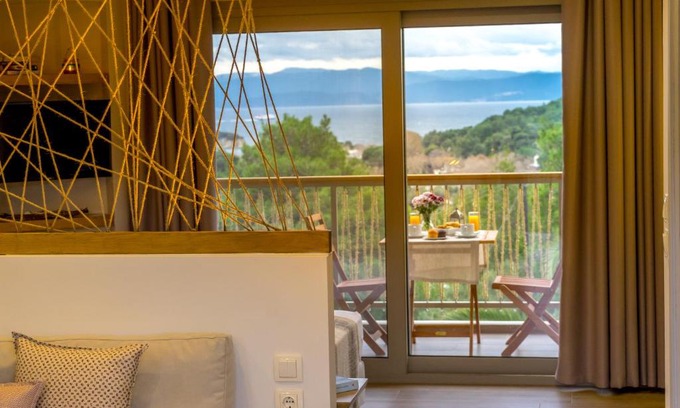 Koukounaries Apartment | Inviting Forest Resort Suites: Family-Friendly Getaway