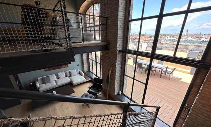 Molina Apartment | Elegant Fortuny Design Loft with Scenic Terrace Retreat