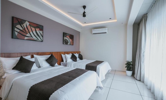 Kasaragod Hotel | Budget-Friendly Fortview Suites with Family Amenities