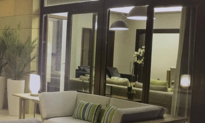 Sheikh Zayed City Apartment | Discover Forty West Side: Accessible Comfort & Breakfast Included