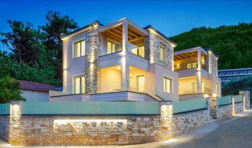 Chrisi Akti Villa | Foti's Villas: Oceanfront Retreat with Exceptional Reviews