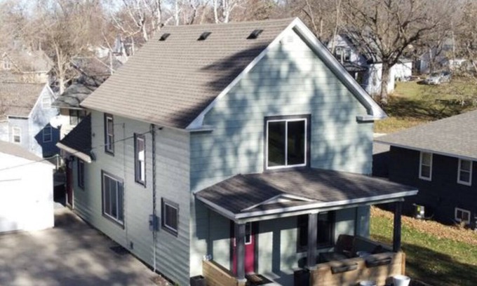 Albert Lea House | Modern Fountain Blue Home with Abundant Outdoor Spaces