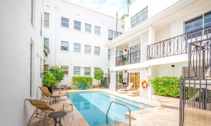 South Pointe Apartment | Cozy Fountain Condo with Pool, BBQ & Ocean View Balcony