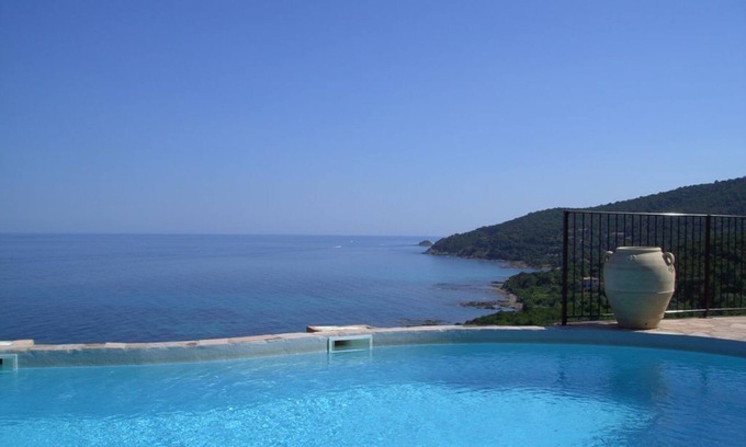 Pinarellu Apartment | Inviting Villa with Oceanfront Views and Pool Access