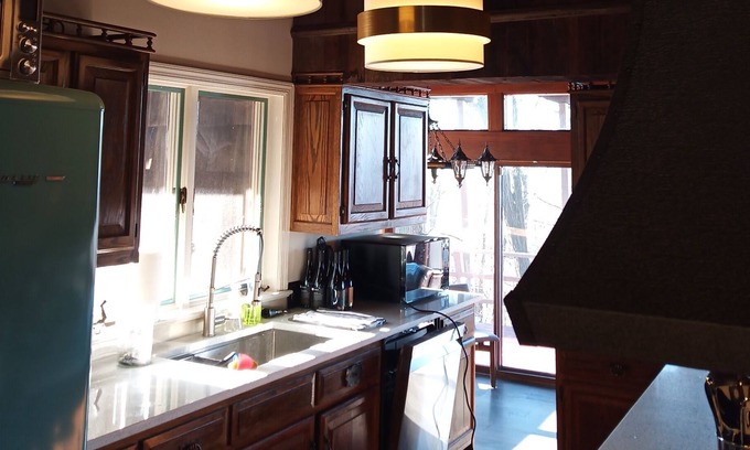 Connellsville House | Frank Lloyd Wright inspired property with sweeping views