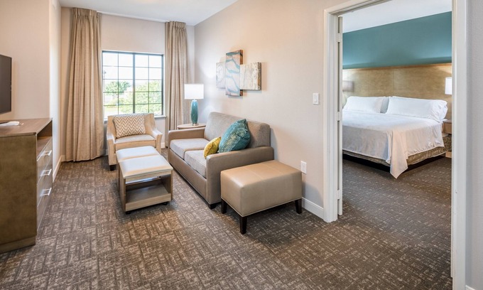 Lake Jackson Condo | Relaxing King Suite with Kitchen, Pool & Free Breakfast