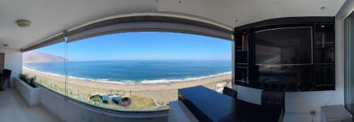 Cavancha Apartment | Convenient Daily Rentals in Iquique with Pool Access