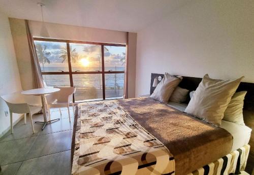 Cruz das Almas Apartment | Oceanfront Flat with Pool & Restaurant - Rated 9.6/10