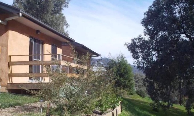 Mountain Bay Cottage | Pet-Friendly Frogsong Strawbale Cottage with Lake Views