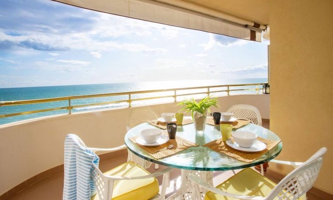 Calafell Apartment | Oceanfront Retreat: Front Beach by Interhome, Rated 9.2/10
