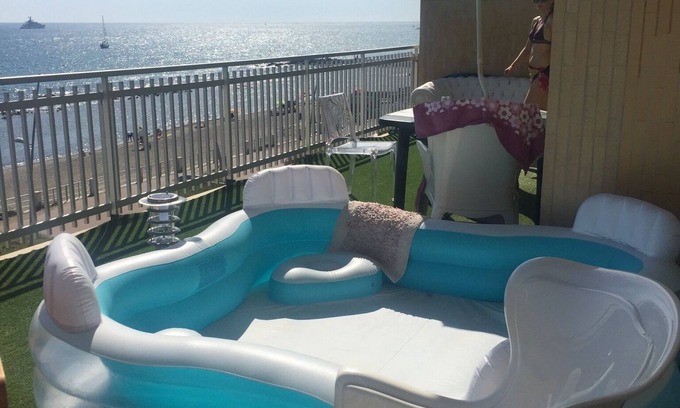 Lido di Ostia Apartment | Ocean View Retreat on the Front Sea's Last Floor