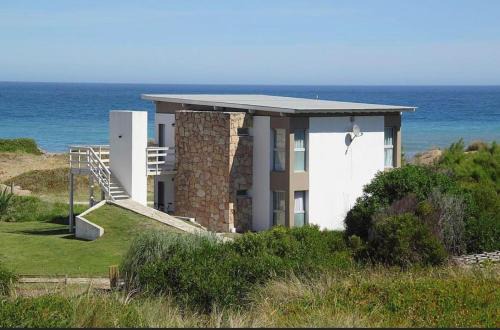 Miramar Apartment | Relax at Frontera Sur Apart with Ocean Views & Pool Access