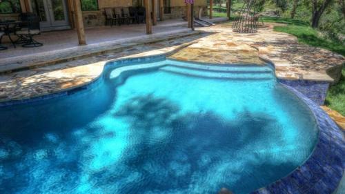 Concan House | Relax at Fryars' Villa: Family-Friendly Retreat with Pool