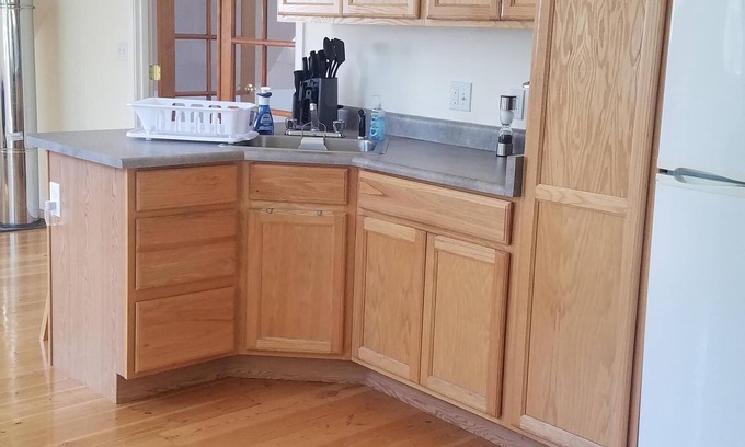 Sandpoint House | Spacious Suite with Kitchen & Private Bedroom - Rated 9.8