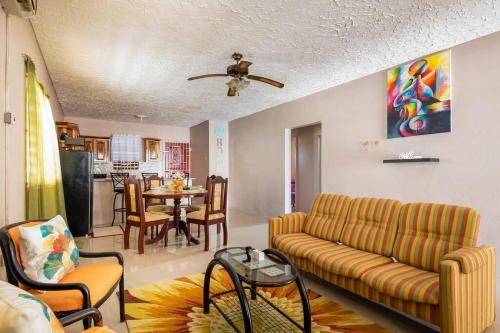 Salt Gut House | Comfortable 2BR Retreat, Steps from Ian Fleming Int Airport