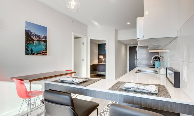 Crescent Heights Apartment | Modern 2 Bedroom Retreat with Downtown Views & Family Amenities