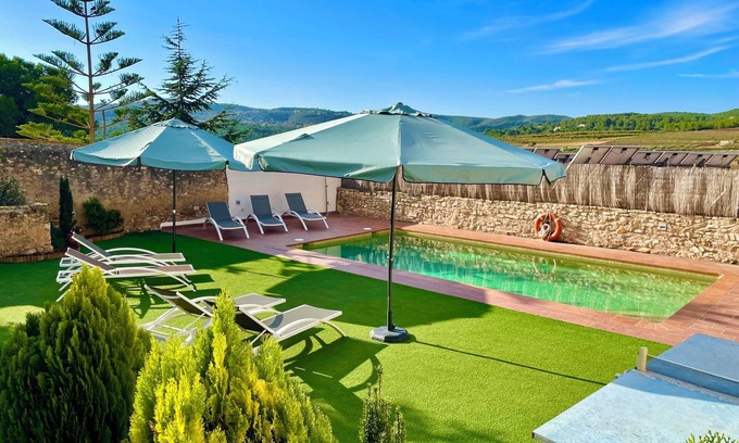 La Bisbal del Penedes Villa | Reimagined Vineyard Retreat with Oceanfront Pool & Spa