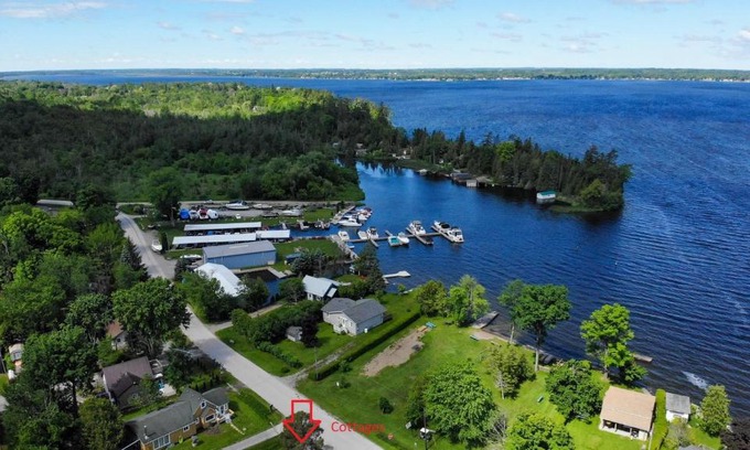 Lindsay House | Fun Place with a Sandy Beach for Swimming, Boating & Fishing, Featuring 1 House and 3 Cabins