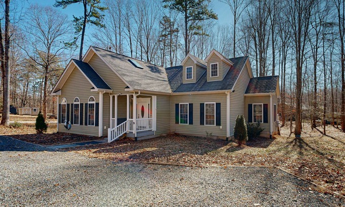 Livingston House | Fun & relaxing getaway with 2 game rooms, fire pits, deck, & more