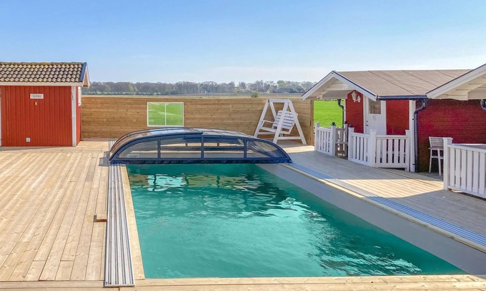 Morup House | Inviting Domicile with Pool, Barbecue & Lake View Retreat