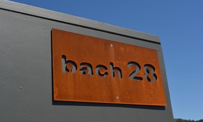 Waihi Beach House | Vibrant Retro Beach Bach with Oceanfront Pool & Spa