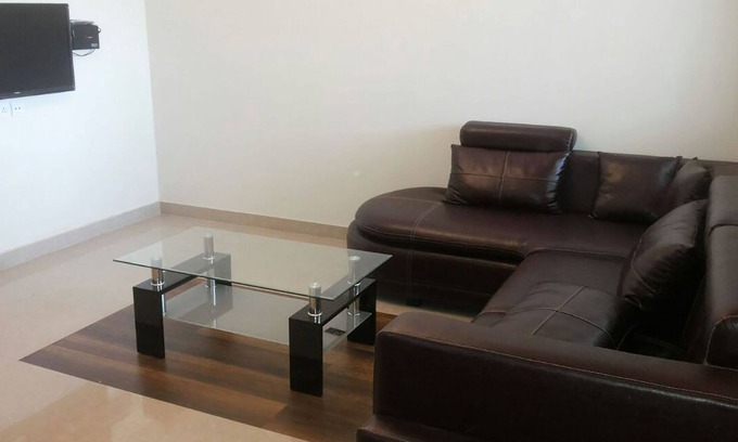 Kozhikode Apartment | Cozy A/C Deluxe Apartment in Hilite City with Kitchen Access