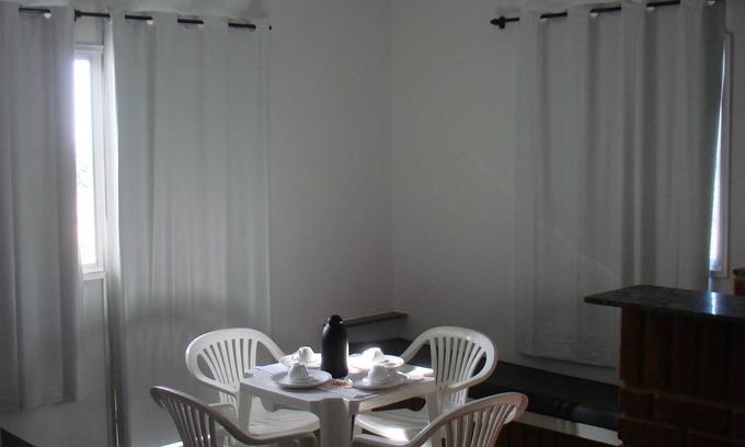 Anchieta Apartment | Cozy Apartment Steps from Castelhanos Beach with Ocean View