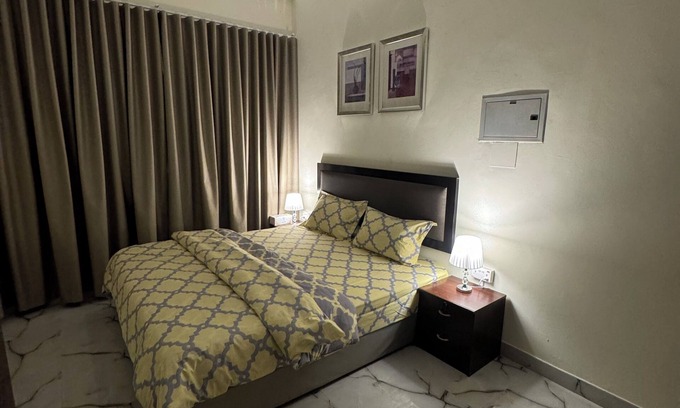 Al Rigga House | Cozy Studio Rooms near Metro with Kitchen & Family Amenities