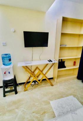 Western Province Apartment | furnished two bedroom apartment with swimming pool, fully equipped gym, private parking space ,children playground and unbeatable scenic city views in kilimani