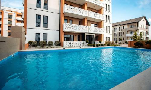 Timisoara Apartment | Discover Future Apartments: Relax by the Pool in Style