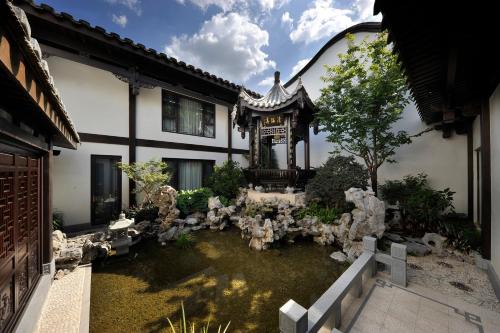 Gulou Hotel | Discover福州三坊七巷三宝宾邸: 5-Star Eco-Friendly Retreat
